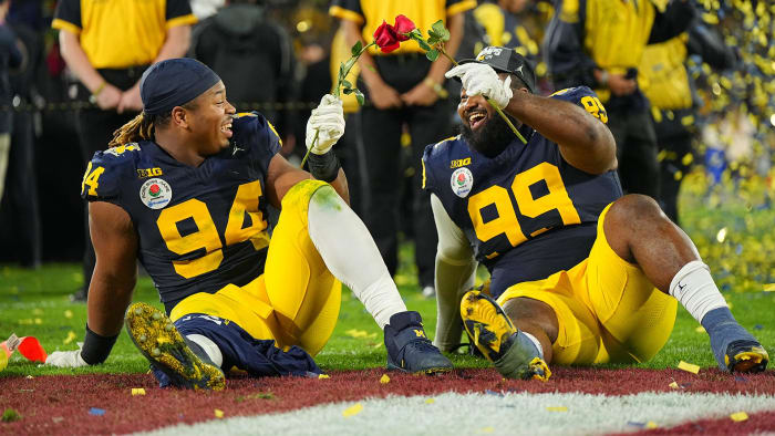 Michigan defensive linemen Kris Jenkins (left) and Cam Goode celebrate at the Rose Bowl.